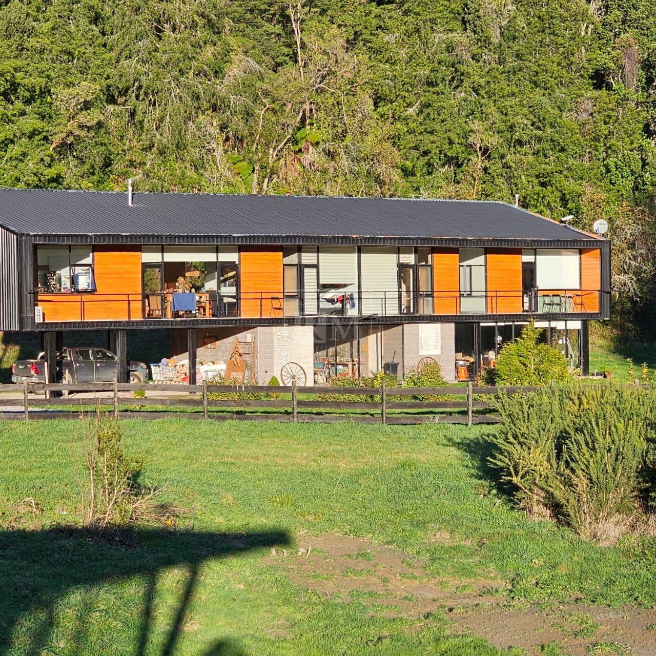 Parcela con casa a orilla rio Futa 